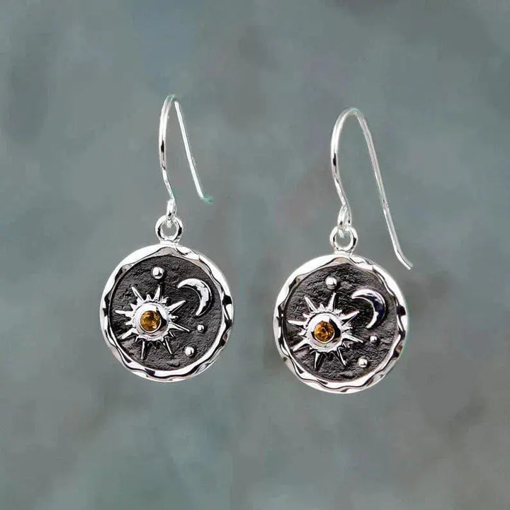 Pendientes con sol y luna en oro y plata