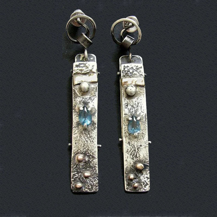 Pendientes hechos a mano con piedra azul