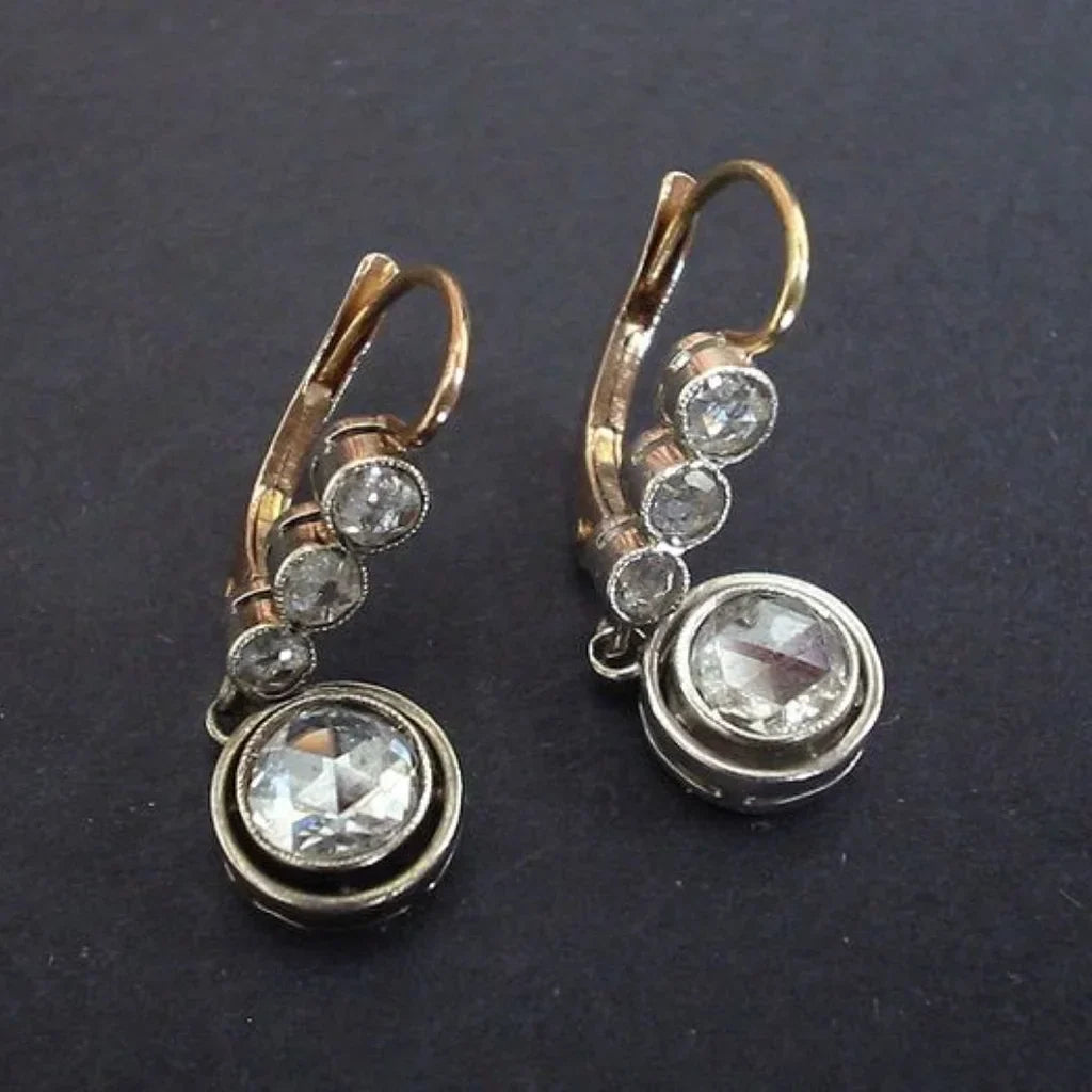 Pendientes vintage dorados con circonita