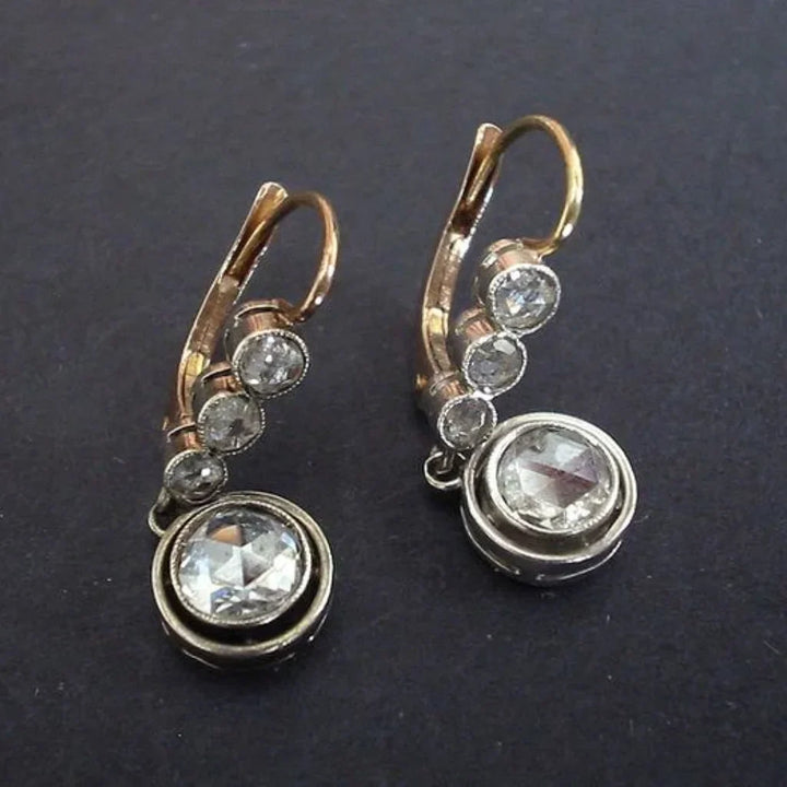 Pendientes vintage dorados con circonita