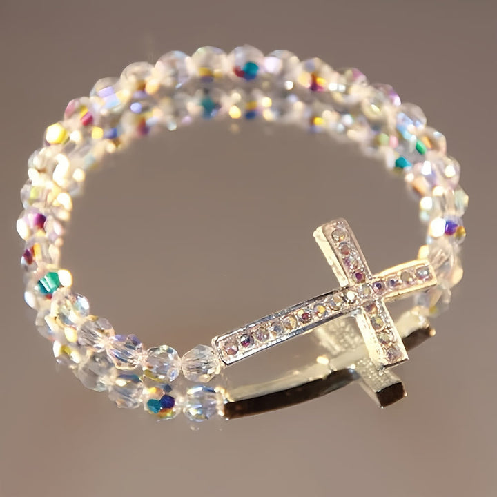 Pulsera Cruz Blanca y Azul Pavo Real: Creencia Envuelta en Brillo