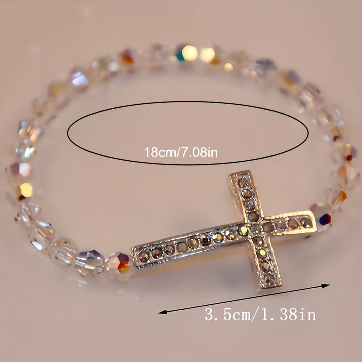 Pulsera Cruz Blanca y Azul Pavo Real: Creencia Envuelta en Brillo