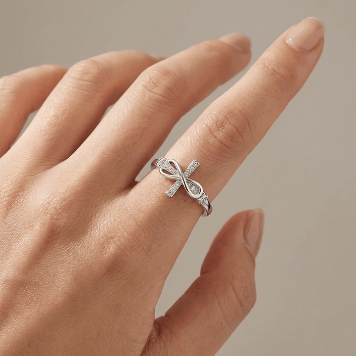 ANILLO DE PLATA CON CRUZ Y LAZO - (AJUSTABLE)