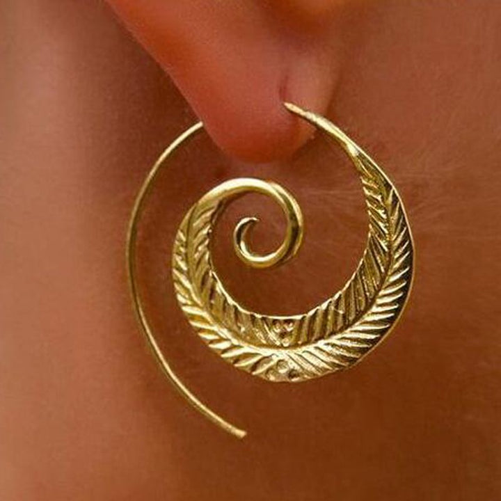 Pendientes vintage en espiral dorada