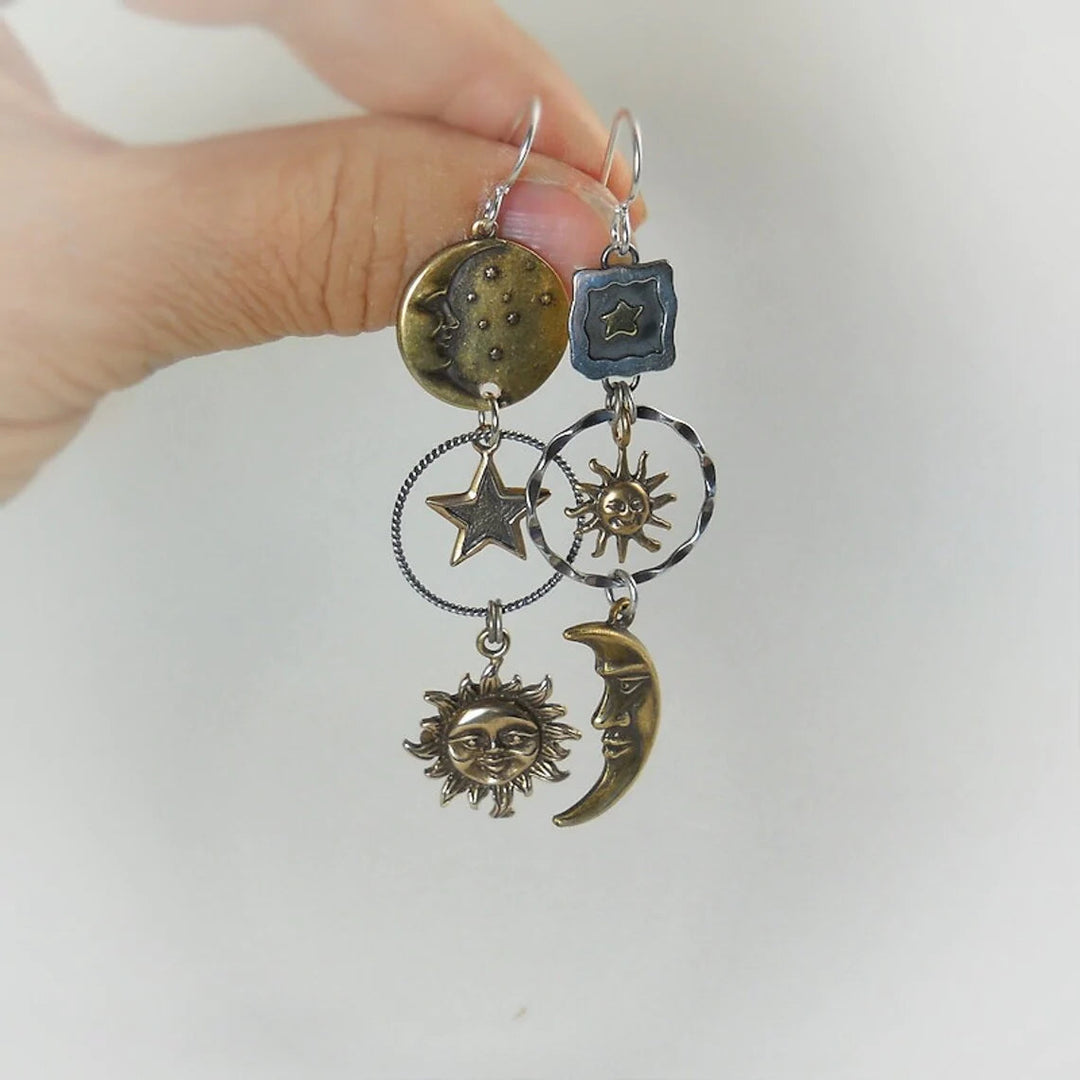 Pendientes con colgantes de sol y luna