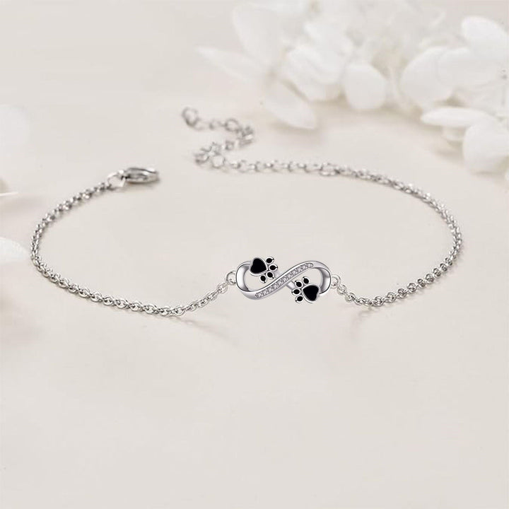 Pulsera con Símbolo de Infinito y Colgante de Huella con Circonitas