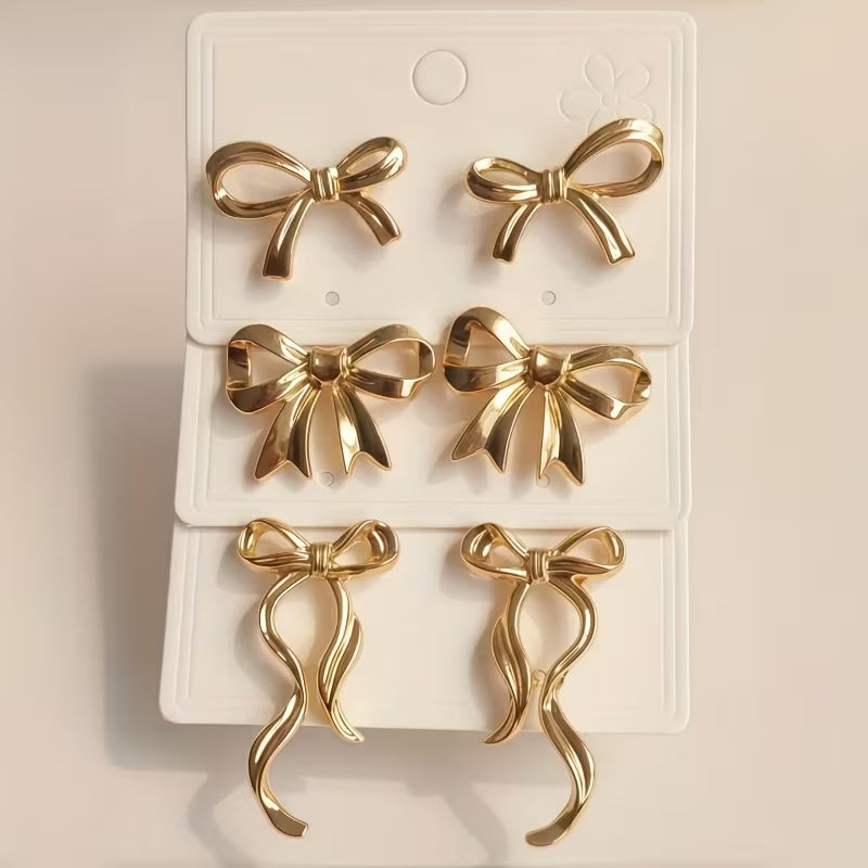Par de pendientes elegantes con lazo de cinta