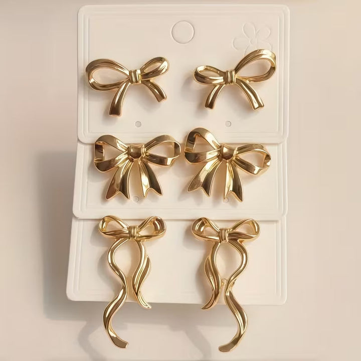 Par de pendientes elegantes con lazo de cinta