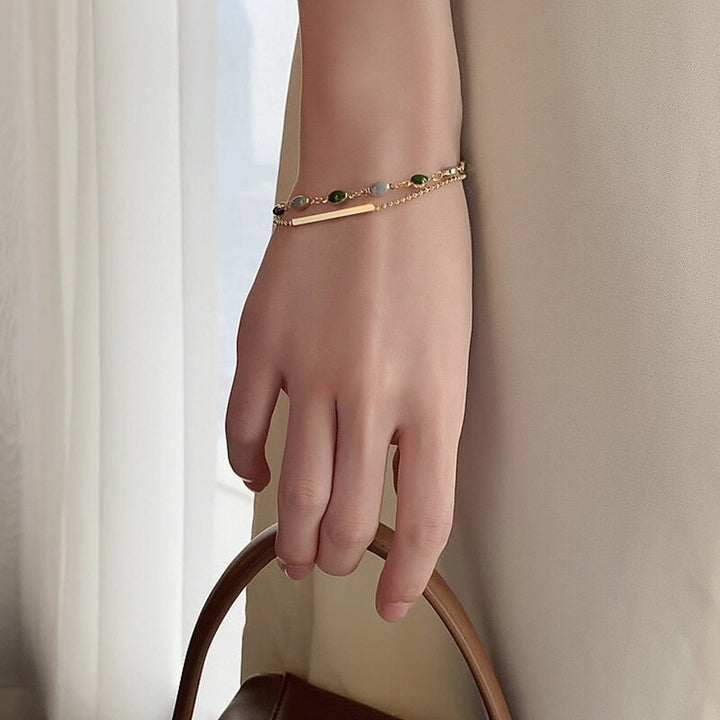 Pulsera doble con charms