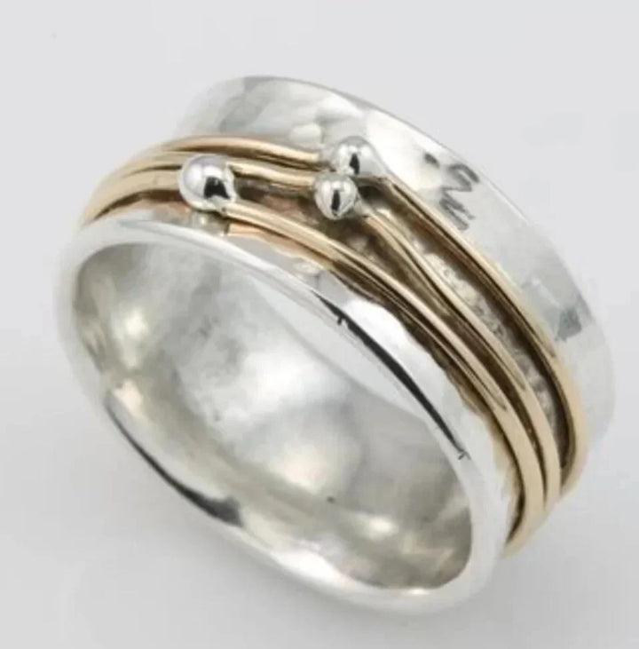 Anillo vintage dorado con capas plateadas