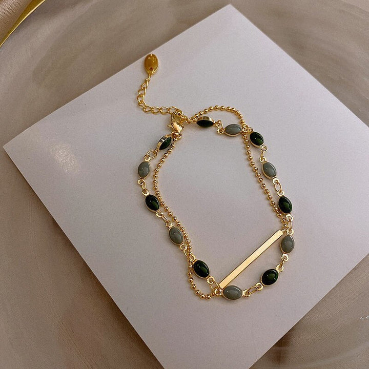 Pulsera doble con charms