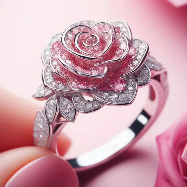 Anillo exótico bañado en plata con flores rosas
