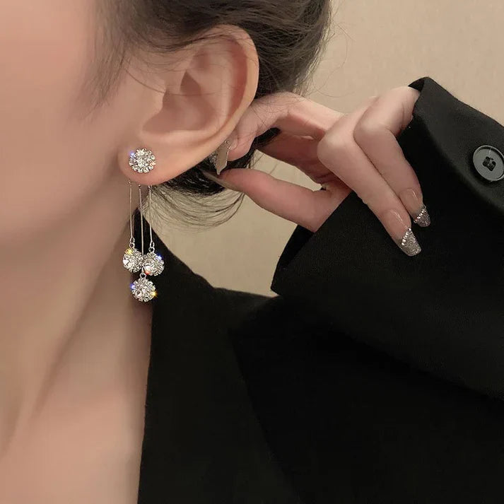 Pendientes Triade de circonita chapados en oro