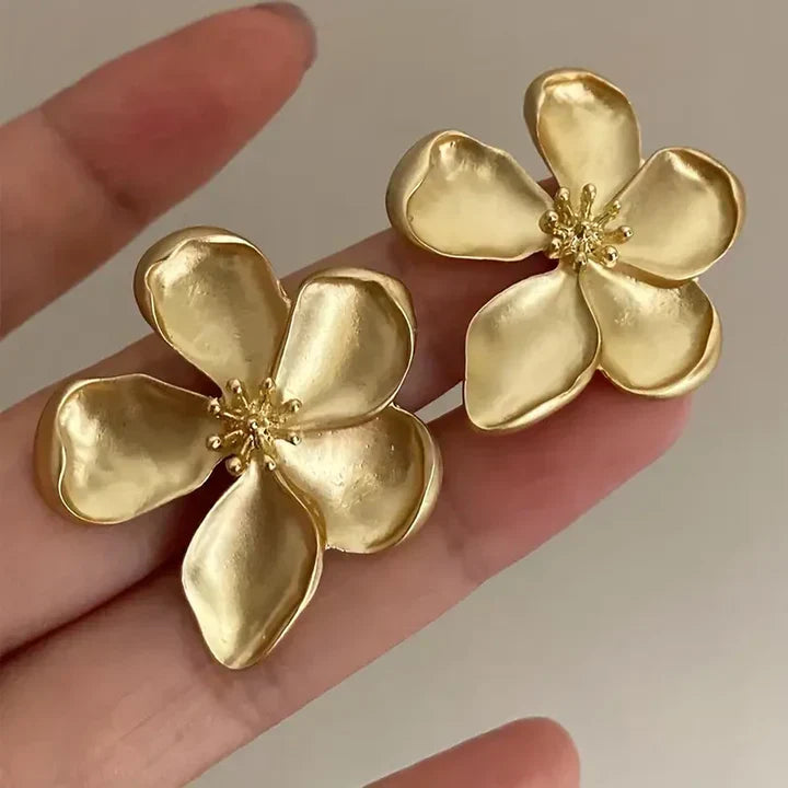 Pendientes de flor dorada