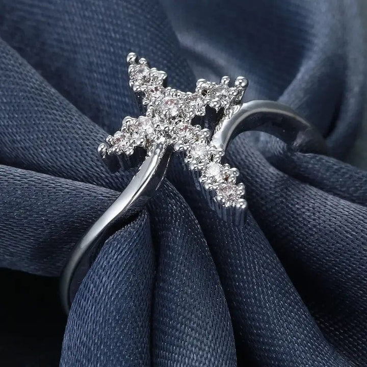 ANILLO CRUZ DE PLATA CUBIERTO DE CIRCONIO