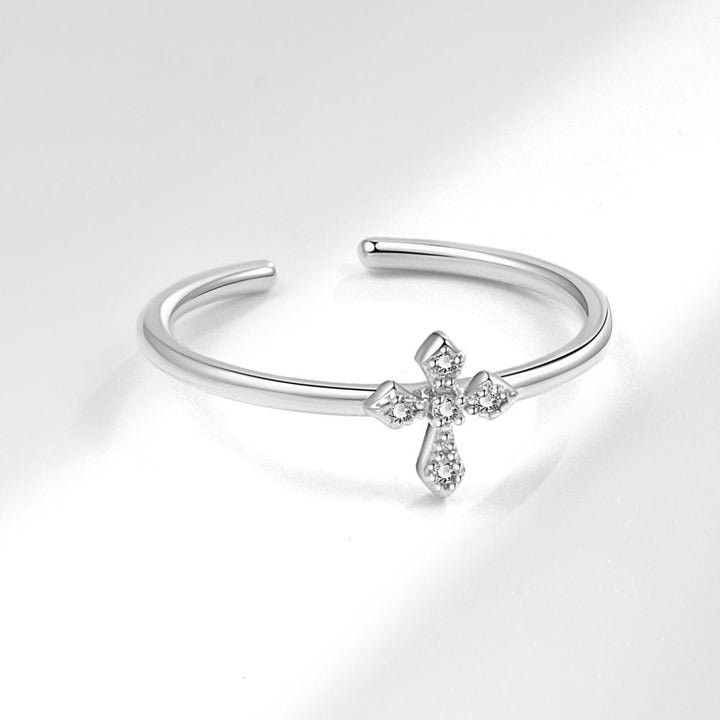 ANILLO BRILLANTE DE CRUZ PLATEADA