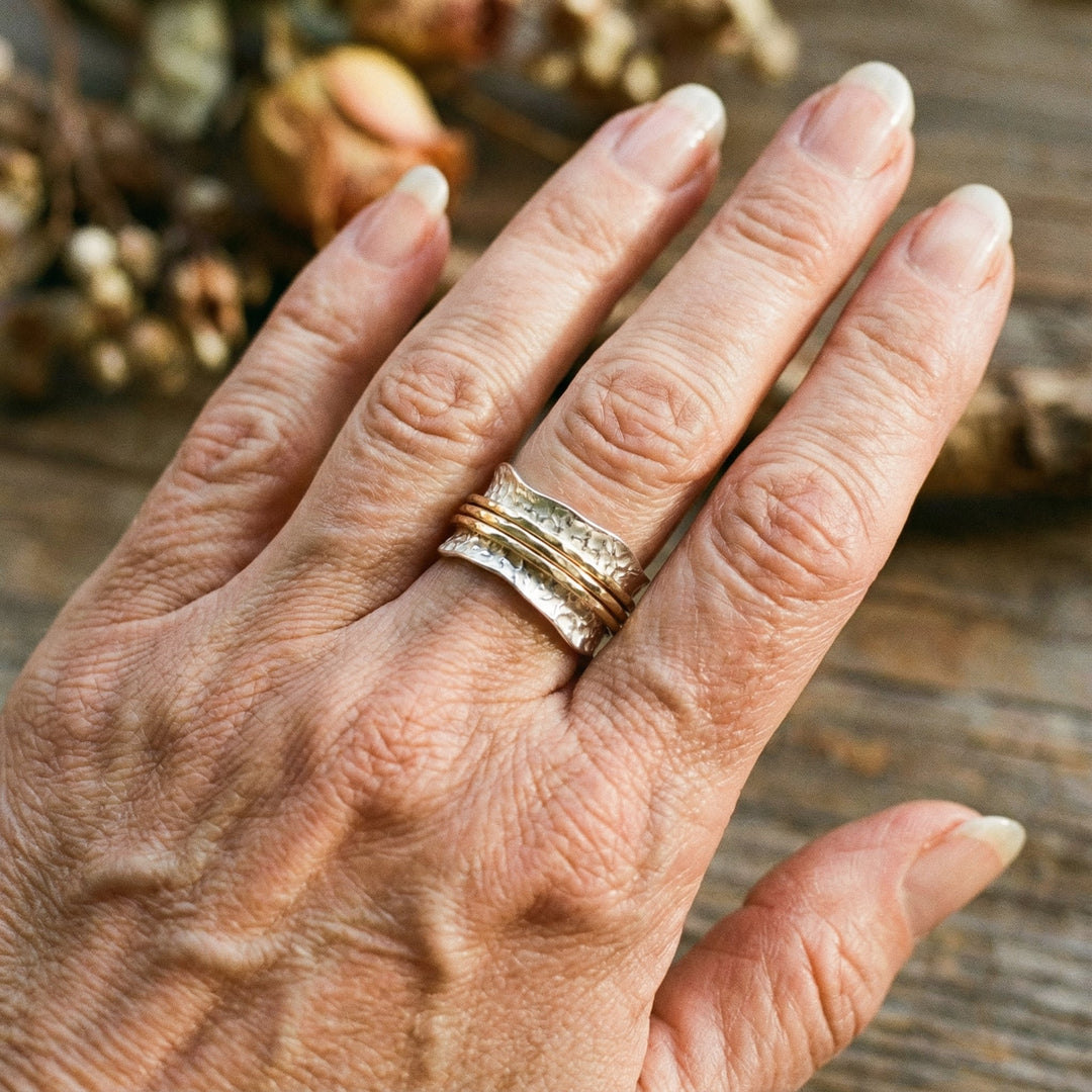 Anillo vintage fino giratorio en dorado y plateado