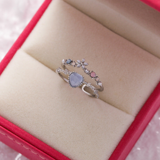 Anillo ajustable de piedra azul con circonita en plata de ley