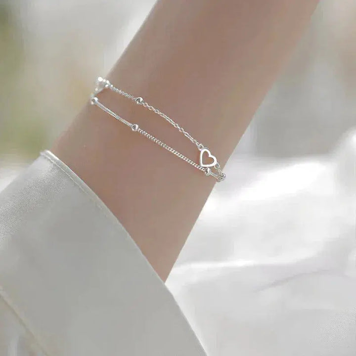 Pulsera ajustable de plata con corazón