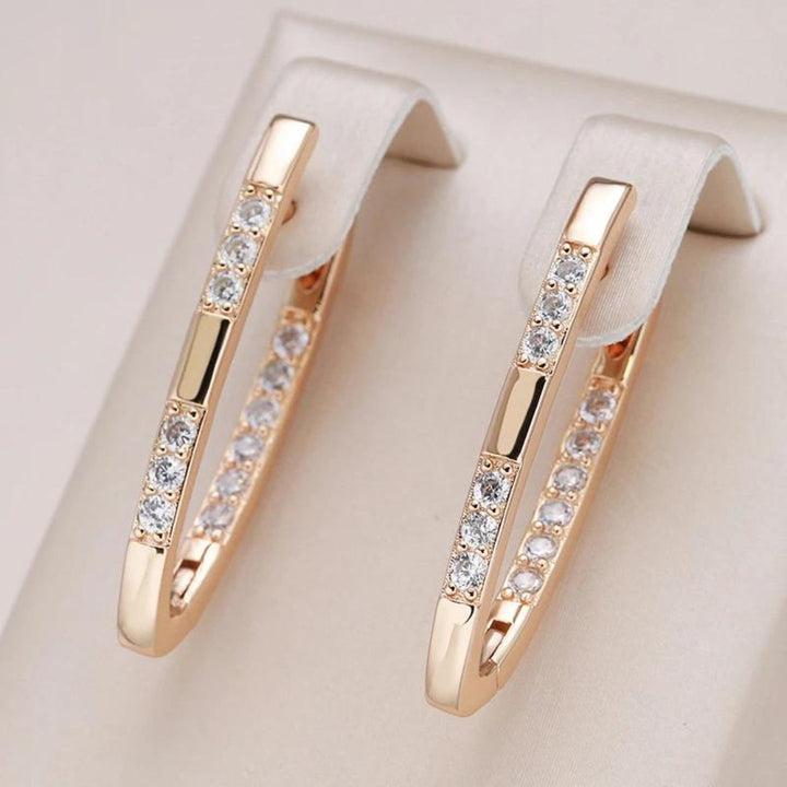Elegantes pendientes de circonita en oro