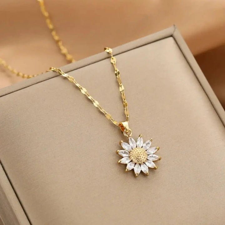 Collar con girasol de cristal dorado