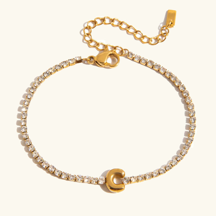Pulsera Elegante de Oro con Letra en Burbuja