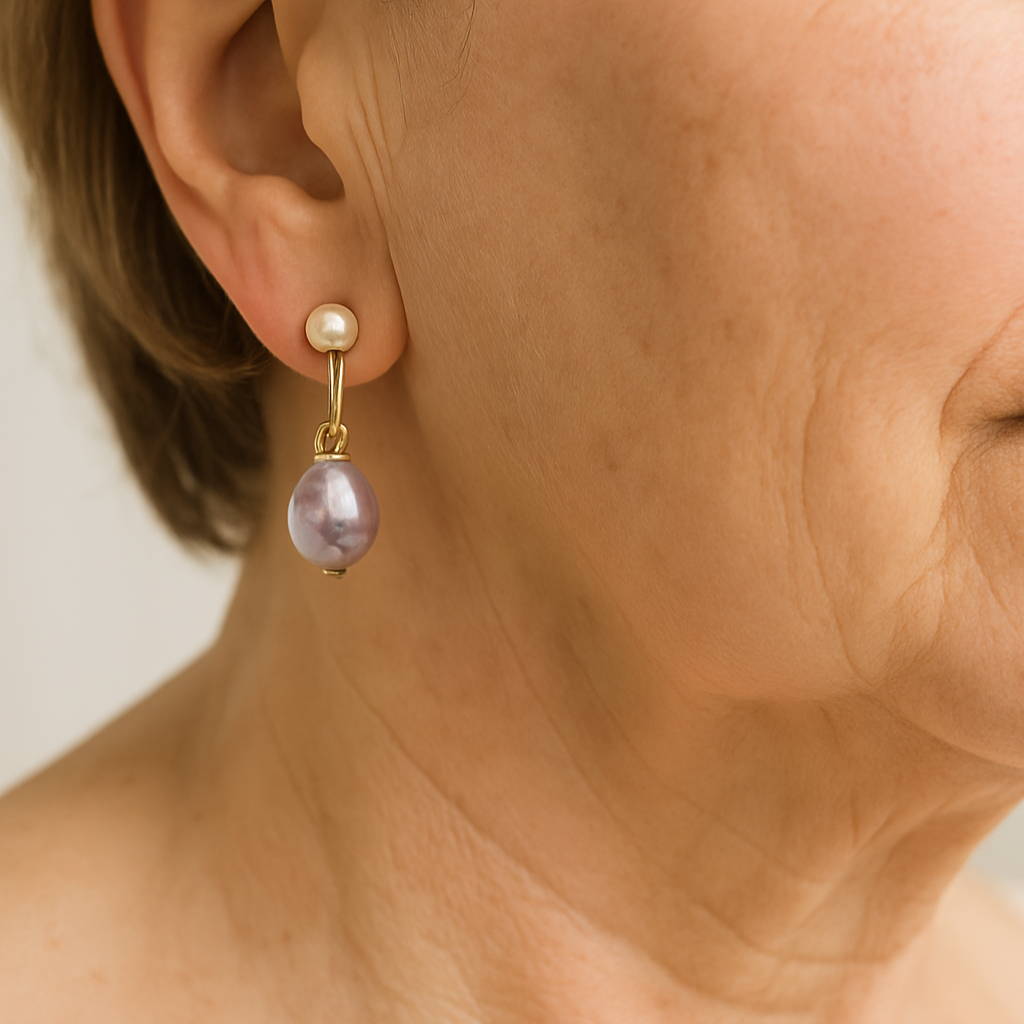 Elegantes pendientes con perla morada