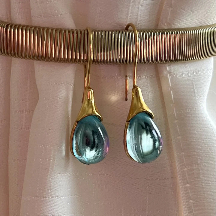 Pendientes redondos verdes brillantes