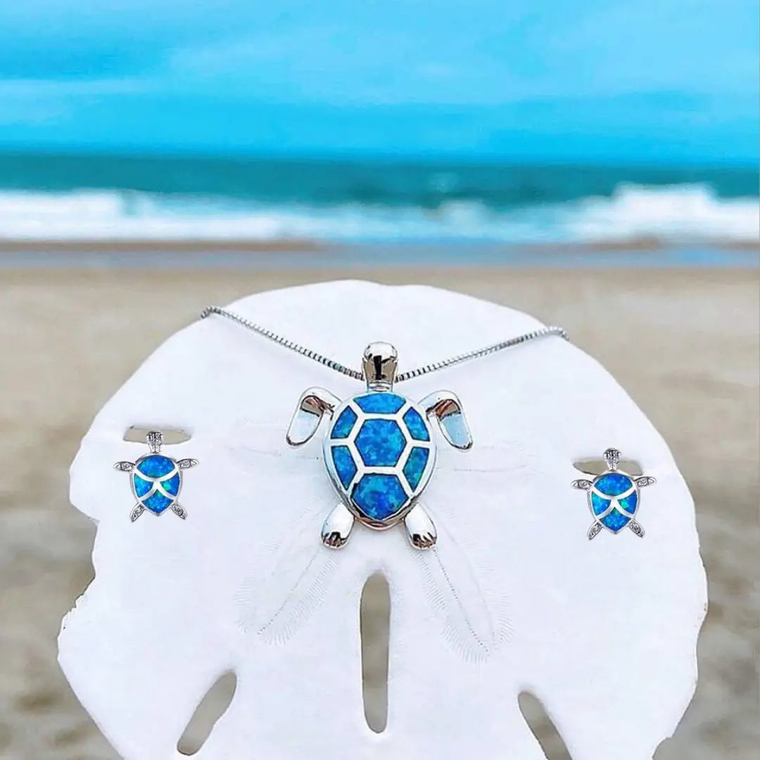 Conjunto de collar y pendientes de tortuga marina en ópalo y plata