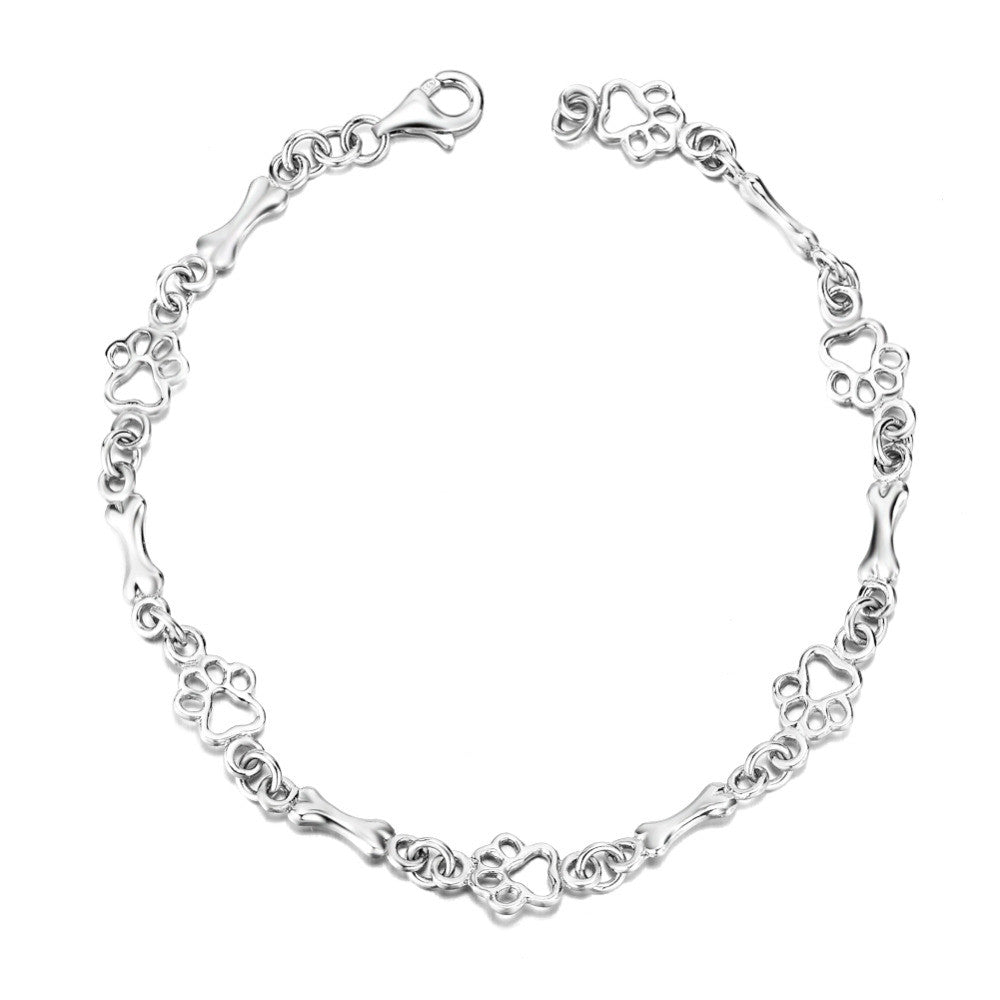 Pulsera con Colgantes de Pata de Perro y Hueso en Plata Pura