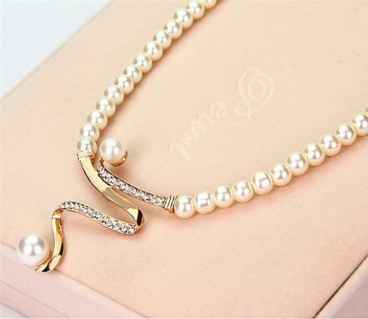 Conjunto de Collar + Pendientes de Perla Natural