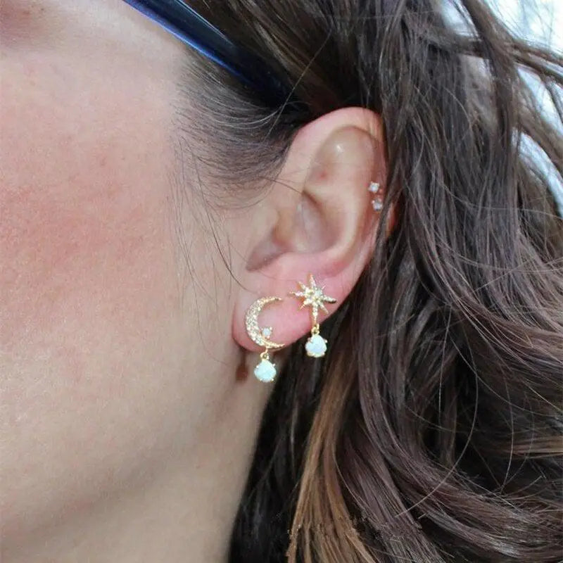 Pendientes de luna y estrella en oro y ópalo
