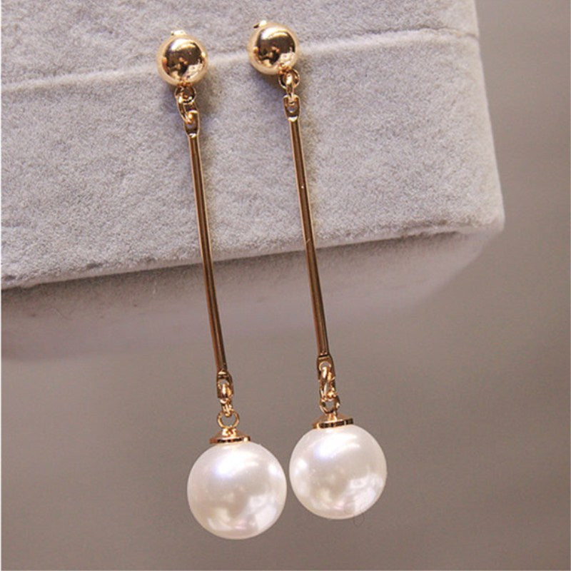 Pendientes colgantes de lujo con perlas especiales colocadas a mano