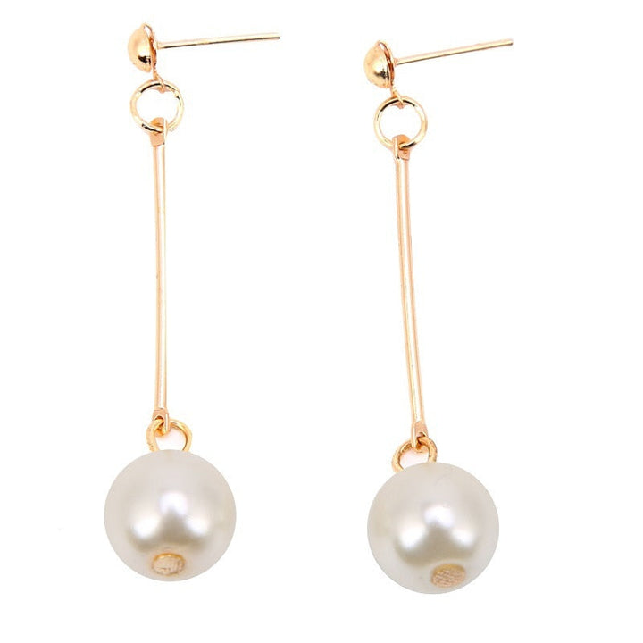 Pendientes colgantes de lujo con perlas especiales colocadas a mano