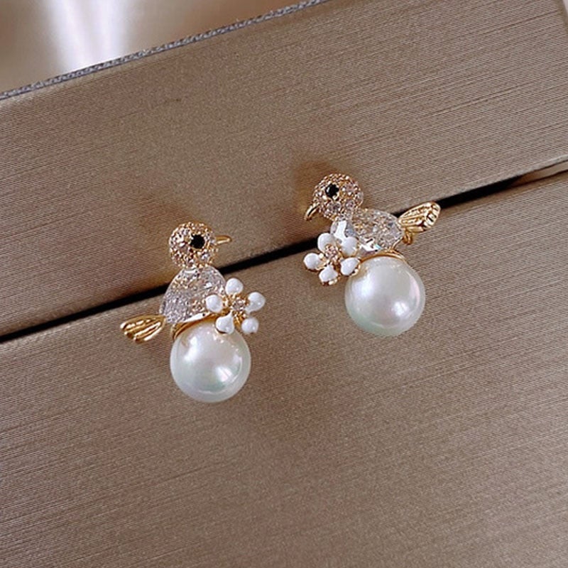 Pendientes de lujo Birdie en zirconia cúbica y revestimiento de perla
