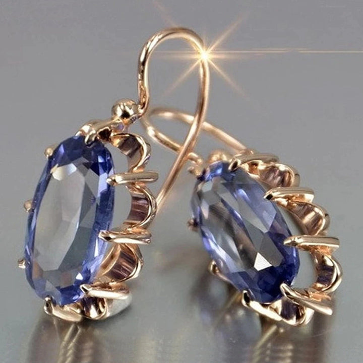 Pendientes de oro con circonita ovalada