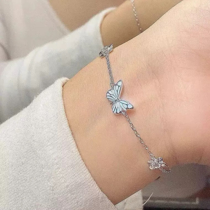 Pulsera de Plata Mariposa Azul que Brilla en la Oscuridad