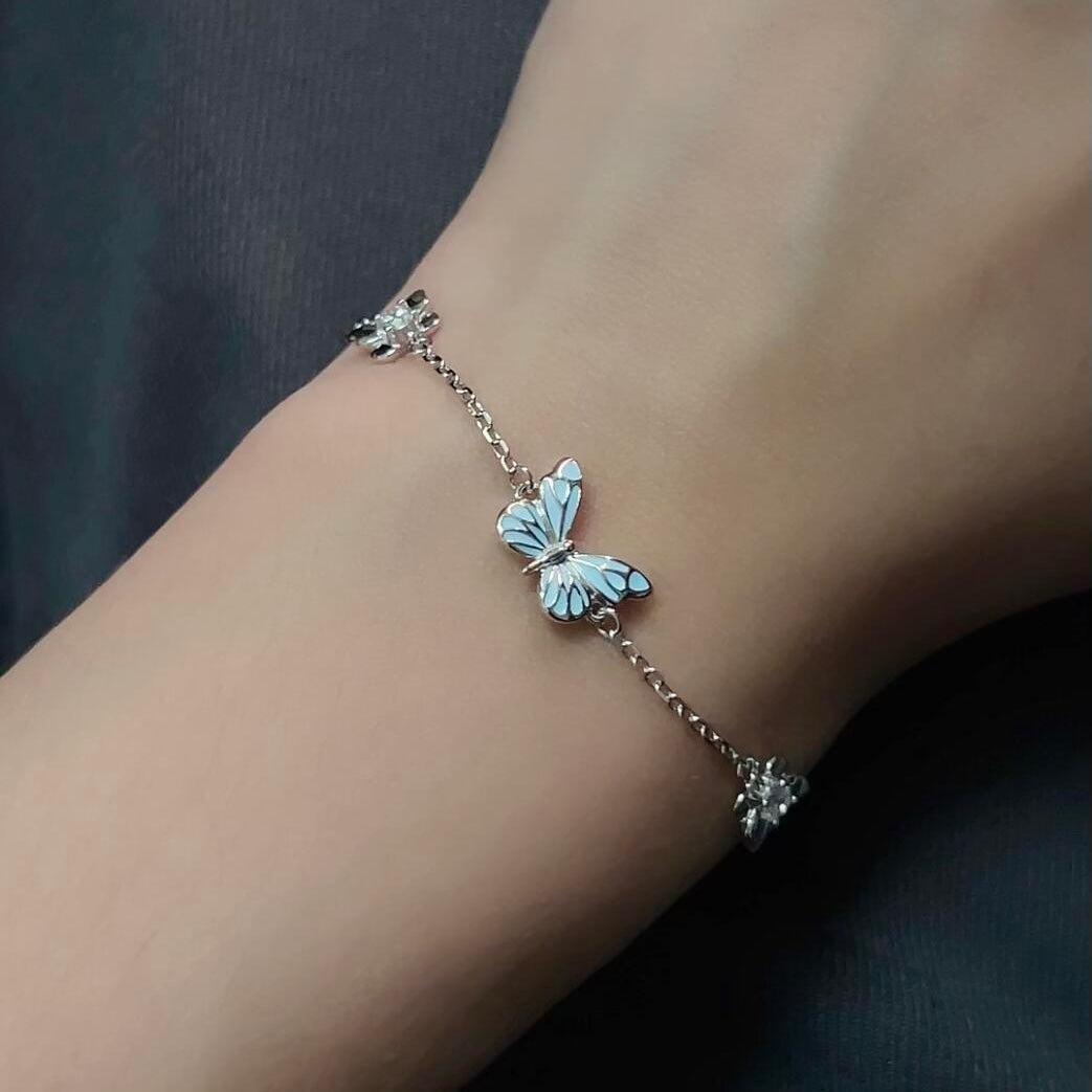 Pulsera de Plata Mariposa Azul que Brilla en la Oscuridad