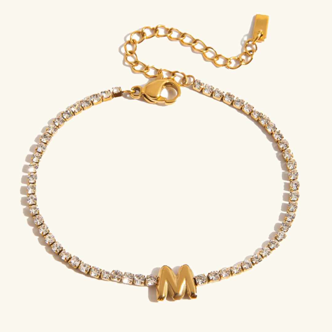 Pulsera Elegante de Oro con Letra en Burbuja