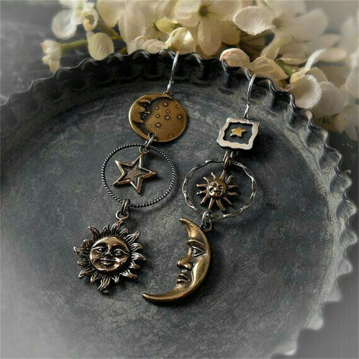 Pendientes con colgantes de sol y luna