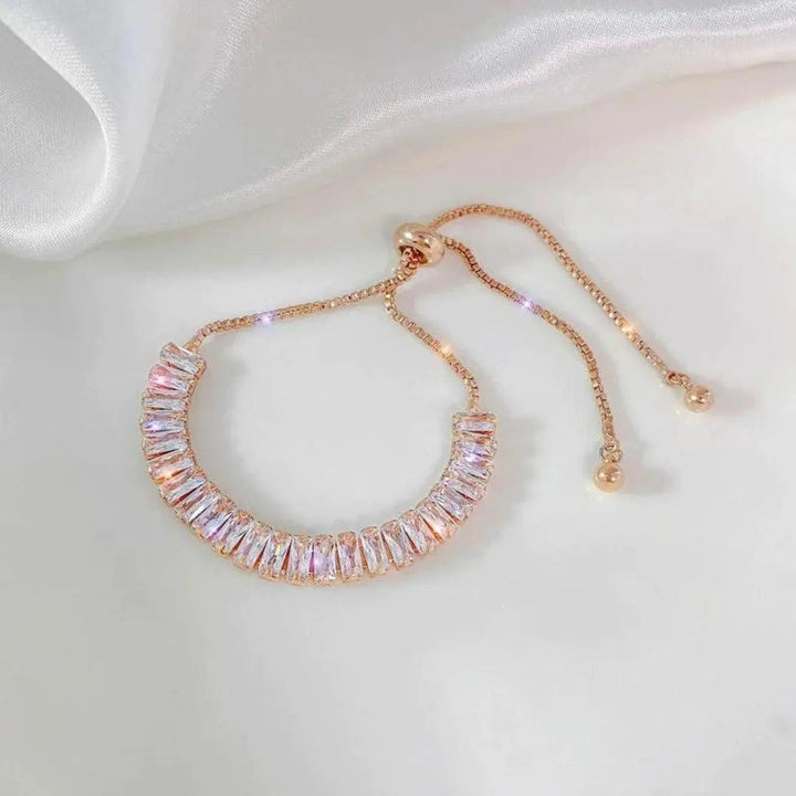 Pulsera ajustable de circonita cúbica en oro y plata