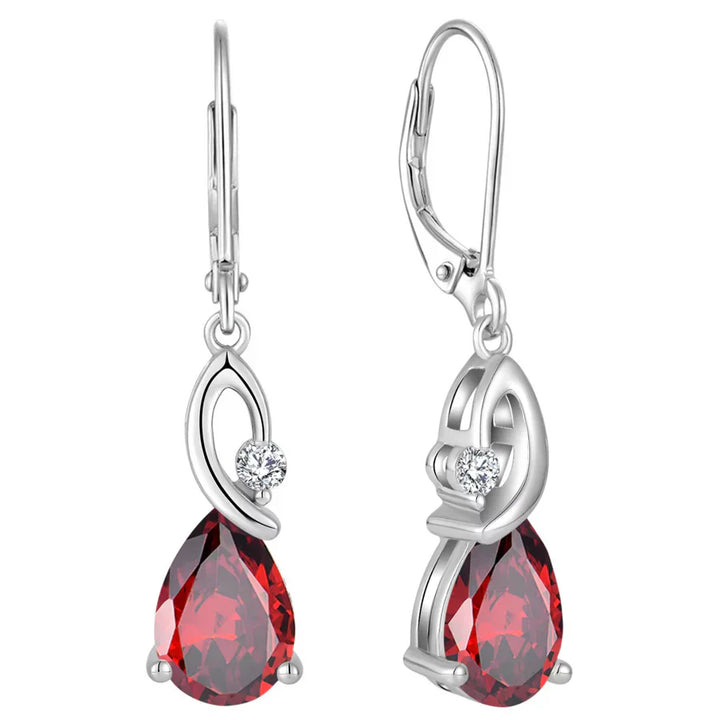 Pendientes en forma de gota con circonita y rubí en corte pera
