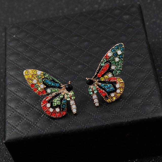 Pendientes de alfiler con forma de mariposa y circonitas de colores