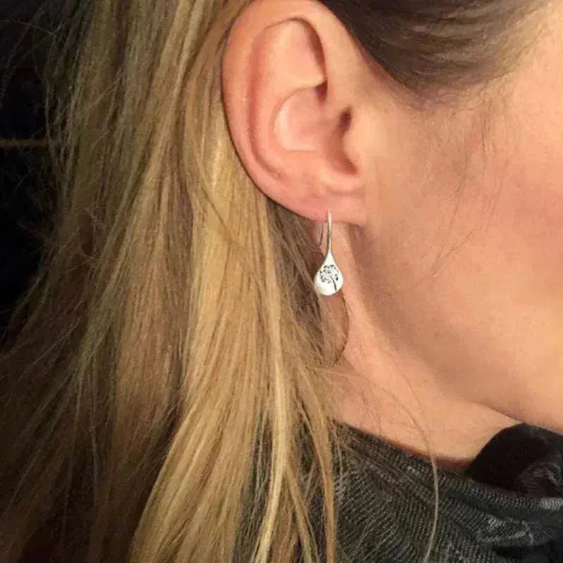 Pendientes de diente de león en plata