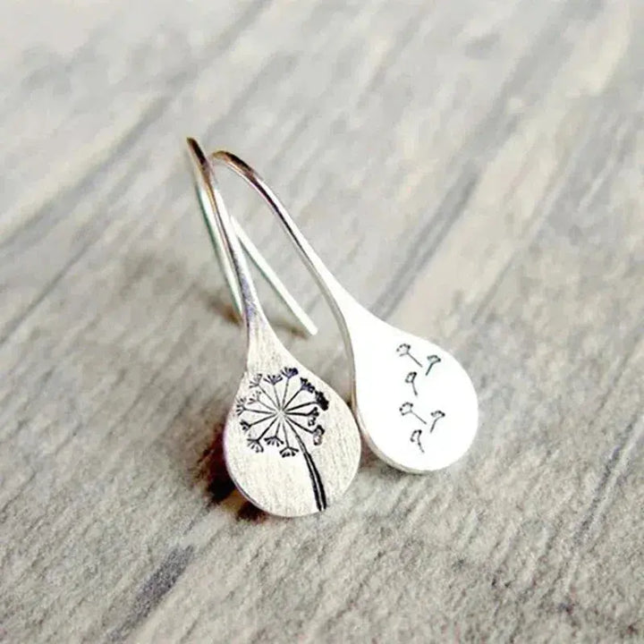 Pendientes de diente de león en plata