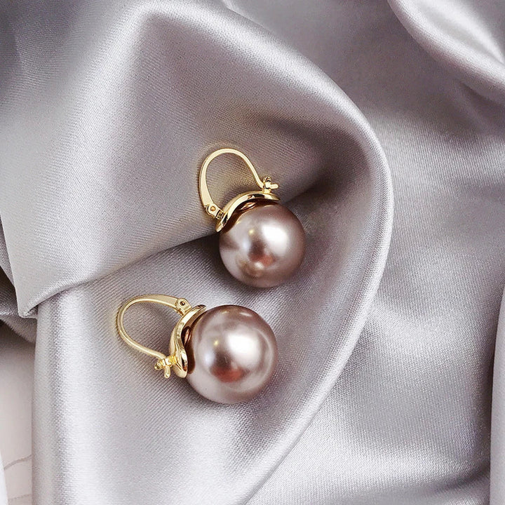 Pendientes gruesos con perlas en oro