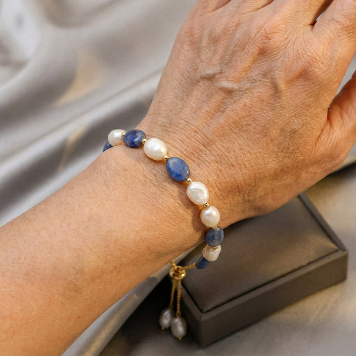 Pulsera elegante de perlas del océano