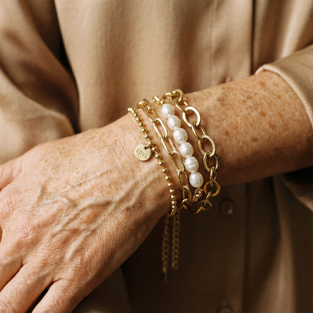 Pulseras de oro con perlas