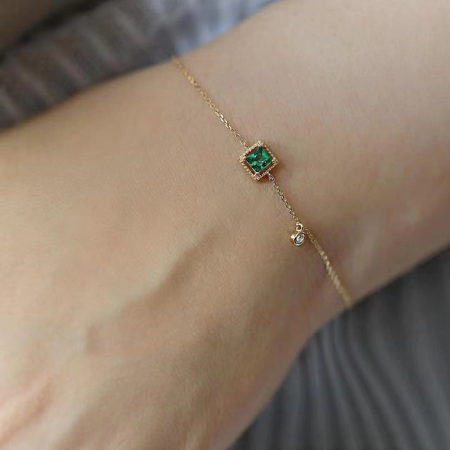 Pulsera de oro con cristal verde
