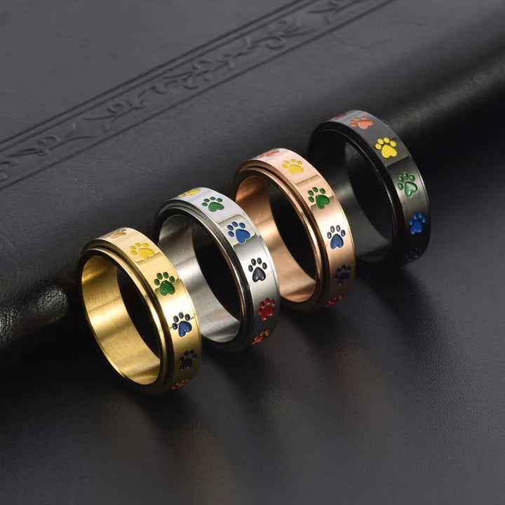Anillo Giratorio para Reducir el Estrés – Acero Inoxidable con Huellas Arcoíris
